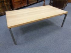 A contemporary oak effect low coffee table
