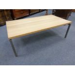 A contemporary oak effect low coffee table