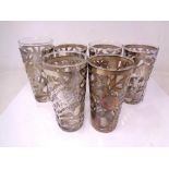 A set of six pierced silver glass holders and glasses, stamped 925,