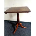 A 19th century tripod table