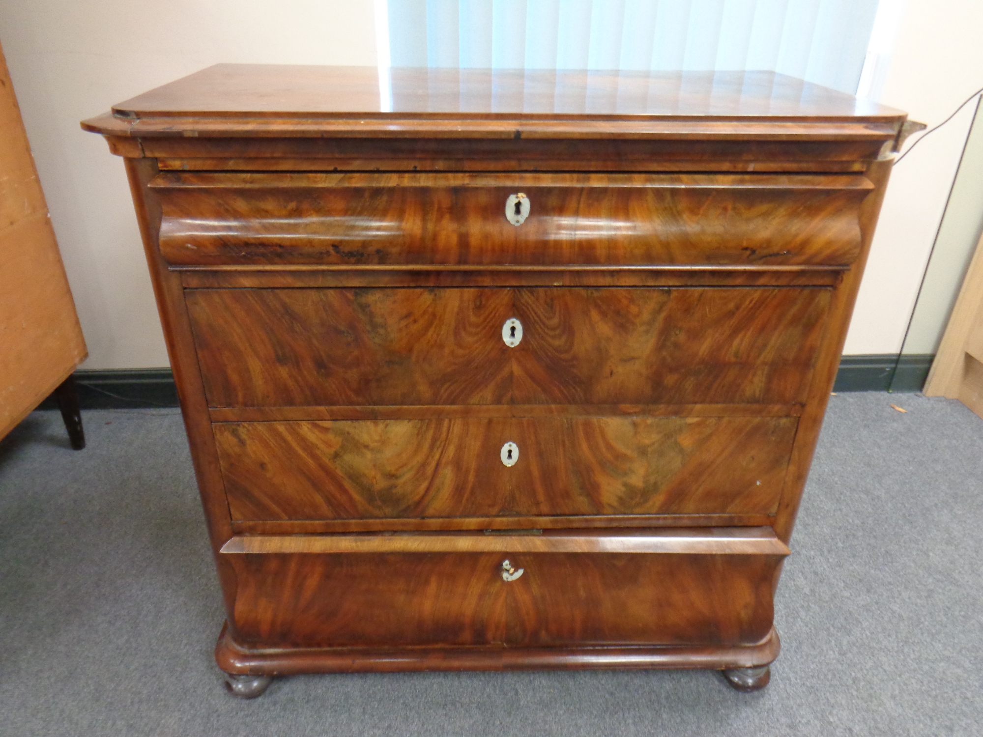A 19th century continental walnut four drawer chest (As found)