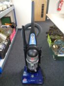 A Bissell upright vacuum cleaner