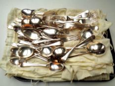 A tray of EPNS table forks and spoons