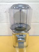 A Beaver coin operated sweet dispenser