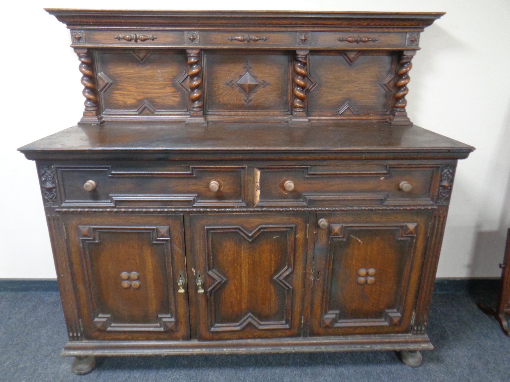 A late Victorian oak sideboard