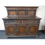 A late Victorian oak sideboard