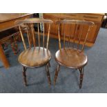 A pair of beech Ibex chairs