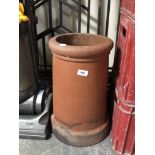 A terracotta chimney pot