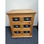 A small pine three drawer chest