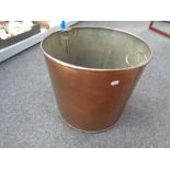 A copper twin-handled pot (diameter 43cm)