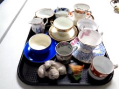 A tray containing antique and later tea ware,