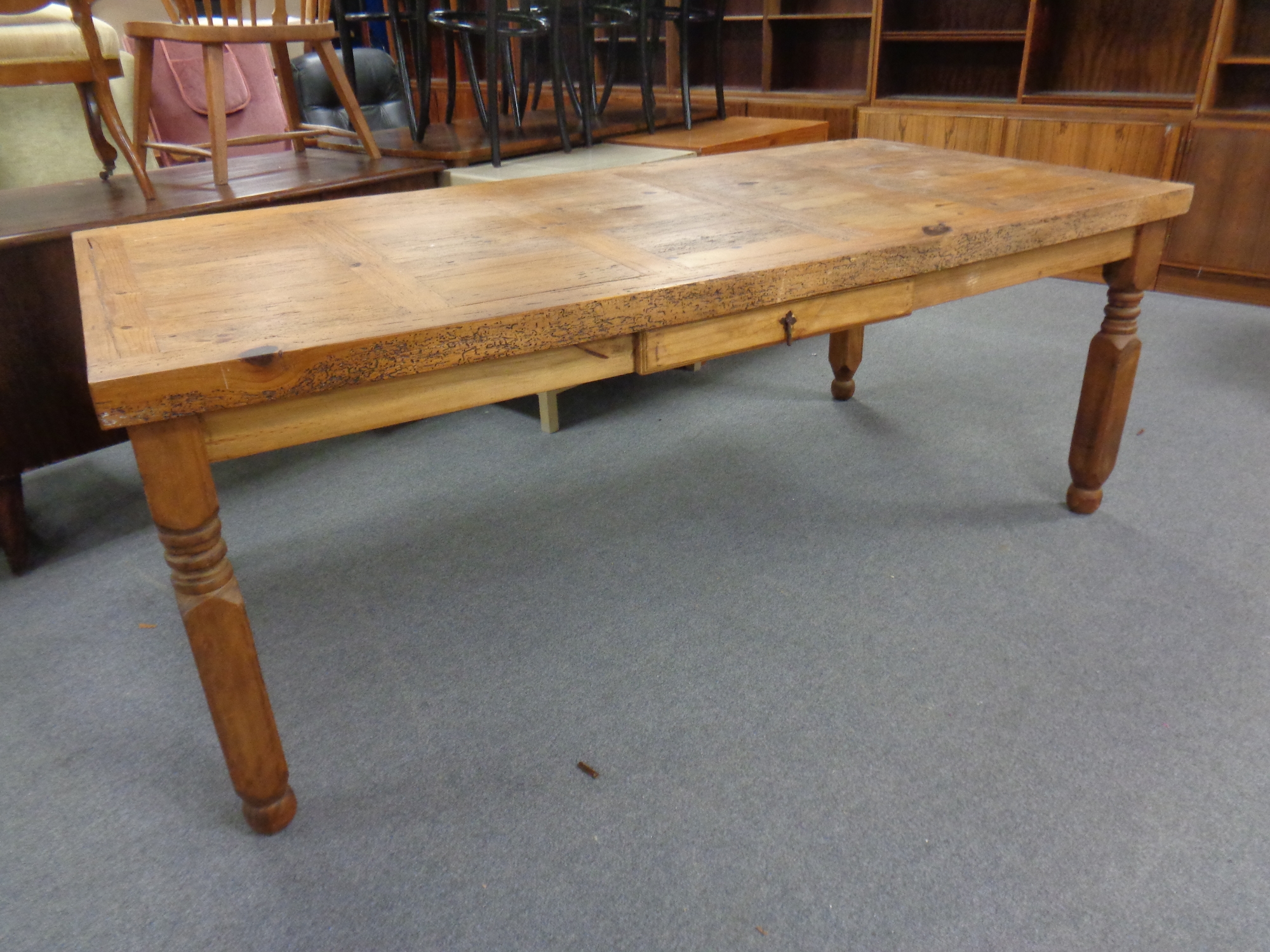 A rustic pine farmhouse style table with a fitted drawer and a set of six rush seated dining chairs - Image 2 of 3