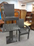 A Jutlandia stained ash square garden table with three matching chairs