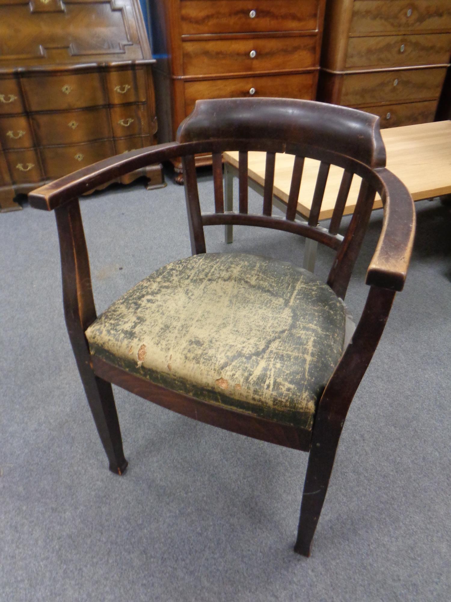 A 19th century stained beech elbow chair