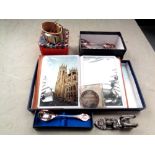 A small leather bound album of modern postcards together with a Fossil wristwatch,