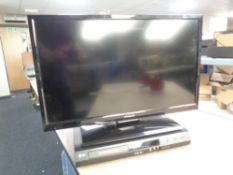 A Polaroid 27 inch LCD TV with LG DVD player,