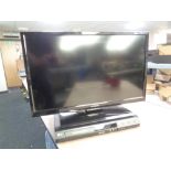 A Polaroid 27 inch LCD TV with LG DVD player,