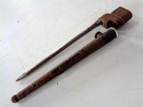 A British spike bayonet in metal sheath