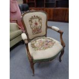 A 19th century continental beech salon chair in tapestry fabric