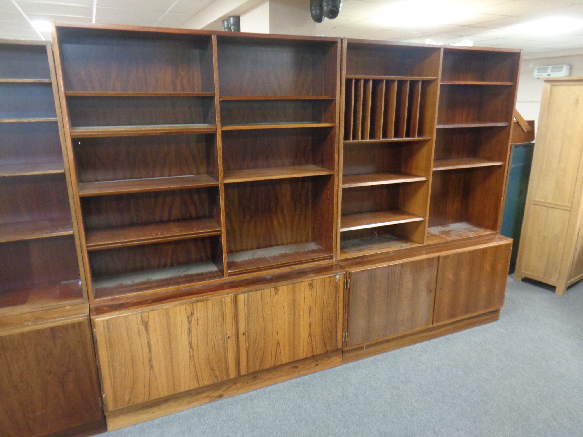 A 20th century rosewood veneered two part continental book case