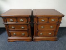 A pair of Colonial style three drawer bedside chests