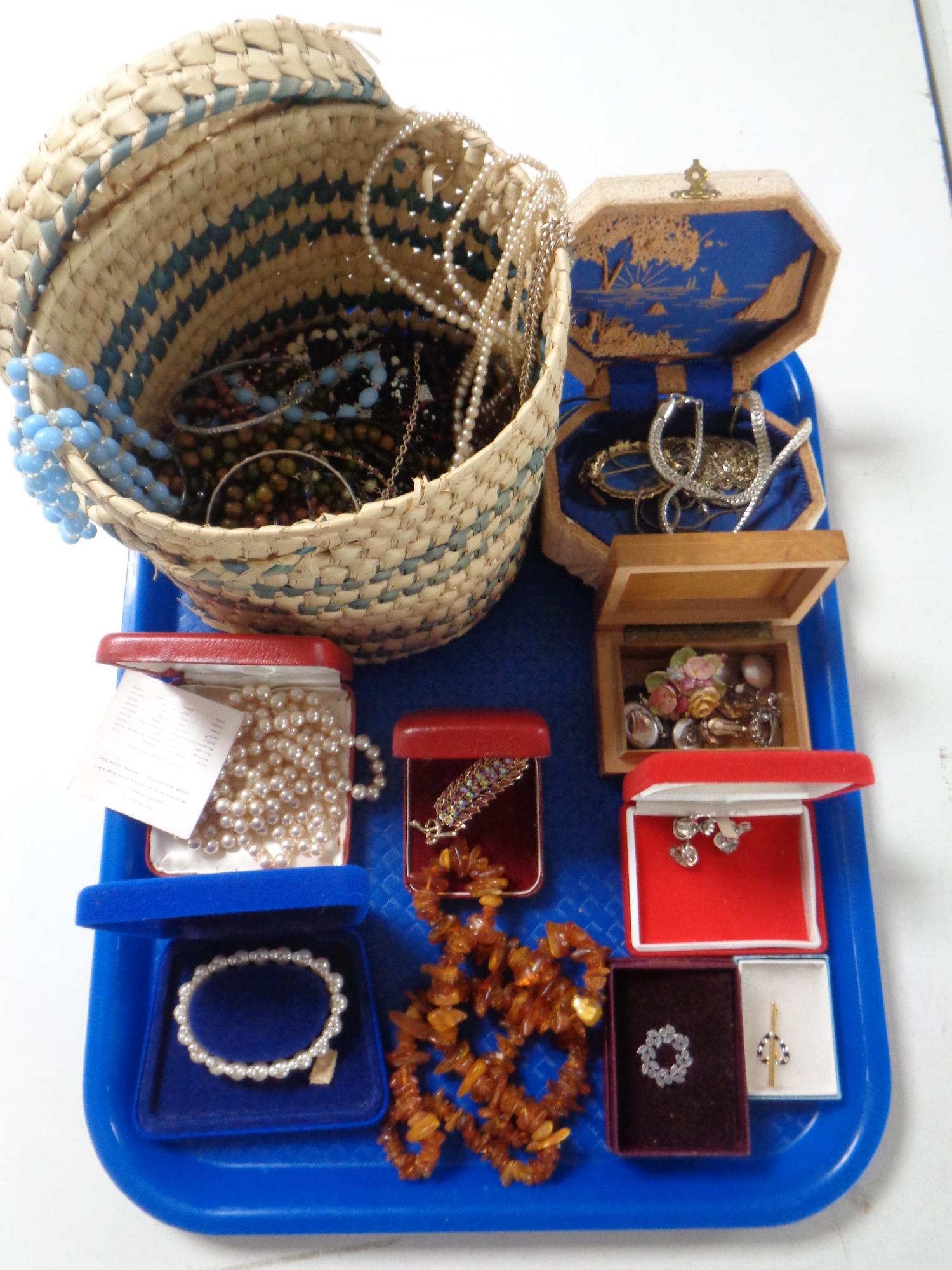 A tray of costume jewelry, simulated pearls,