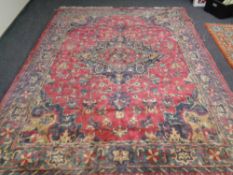 A Heriz design carpet,