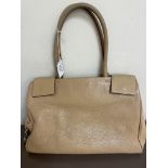 A Prada cream leather handbag