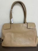 A Prada cream leather handbag