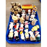 A tray of Friar Chucky ceramic egg holder and quantity of china pig ornaments