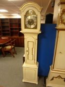 A continental painted and gilt Tempus Fugit longcase clock with pendulum and weights