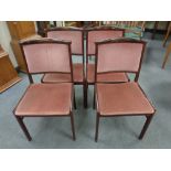 A set of four stained beech framed continental dining chairs