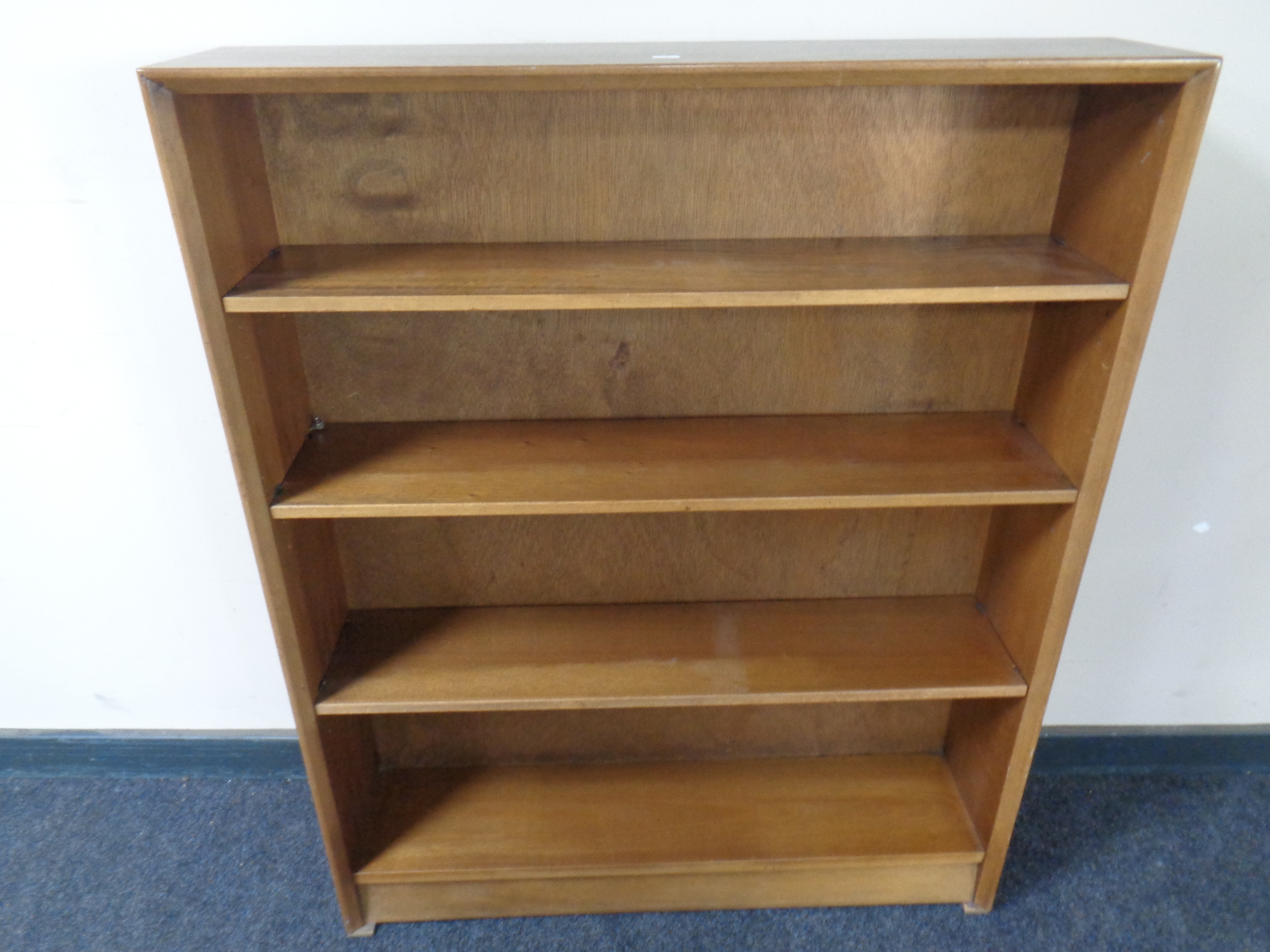 A teak open bookcase