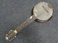 A Mandy Joe metal-bodied banjo ukulele