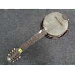 A Mandy Joe metal-bodied banjo ukulele