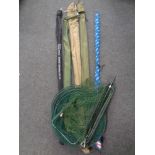 A group of fishing rods including Shakespeare spinning rod, Daiwa rod,