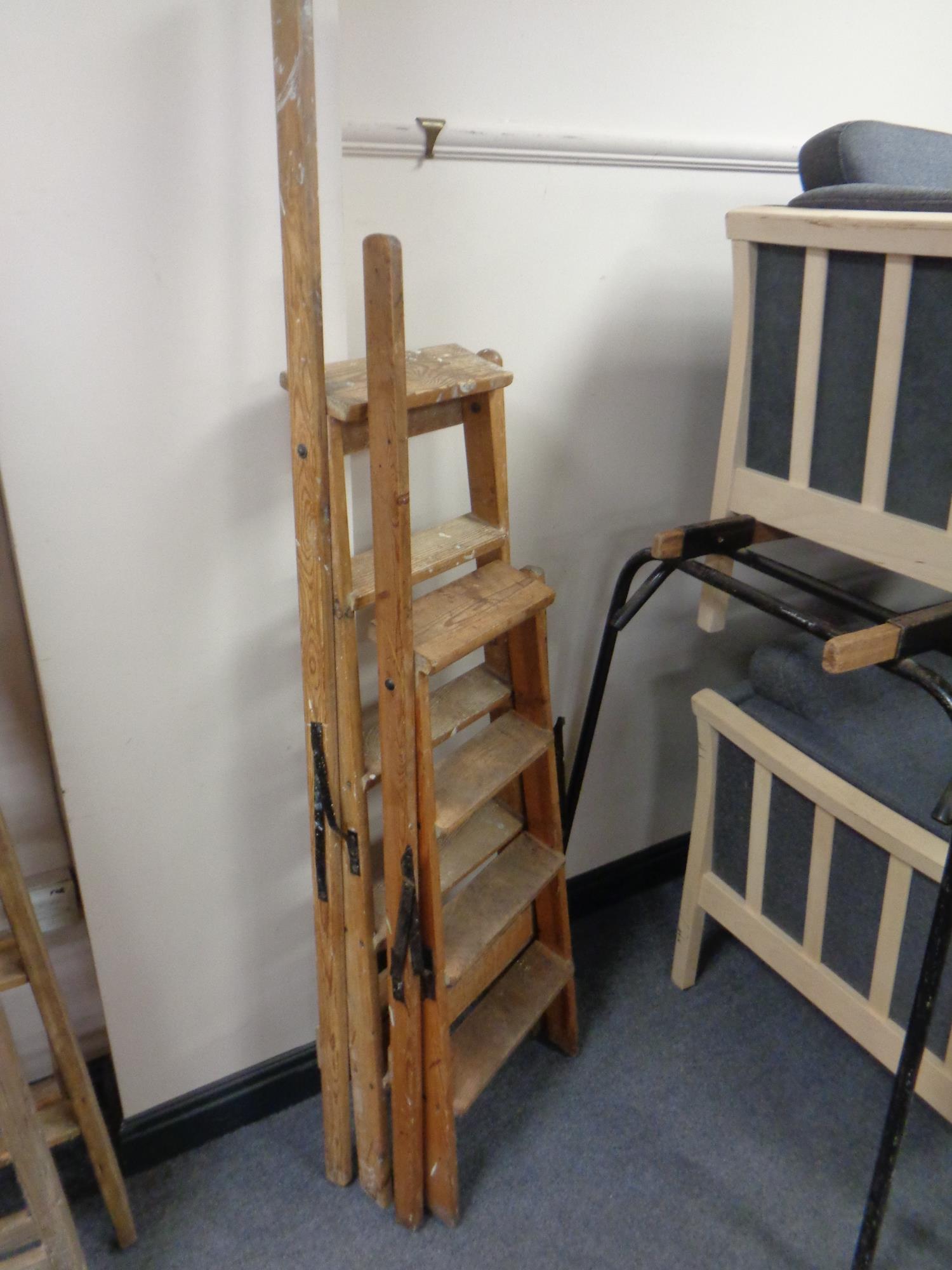 Two early 20th century wooden step ladders