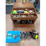 A quantity of fishing equipment including a fishermans box containing Penn and other reels,