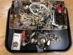 A tray of costume jewellery, bead necklaces,