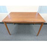 A 20th century teak rectangular dining table