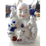 A Chinese export porcelain Buddha group