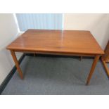 A 20th century teak rectangular dining table