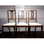 A set of three inlaid dining chairs