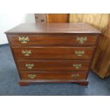 A George III oak chest of four drawers