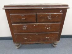 A 19th century pine four drawer chest