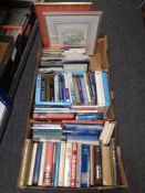 Three boxes containing assorted hard and soft cover books including novels, reference,