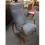 A 20th century beech framed rocking chair