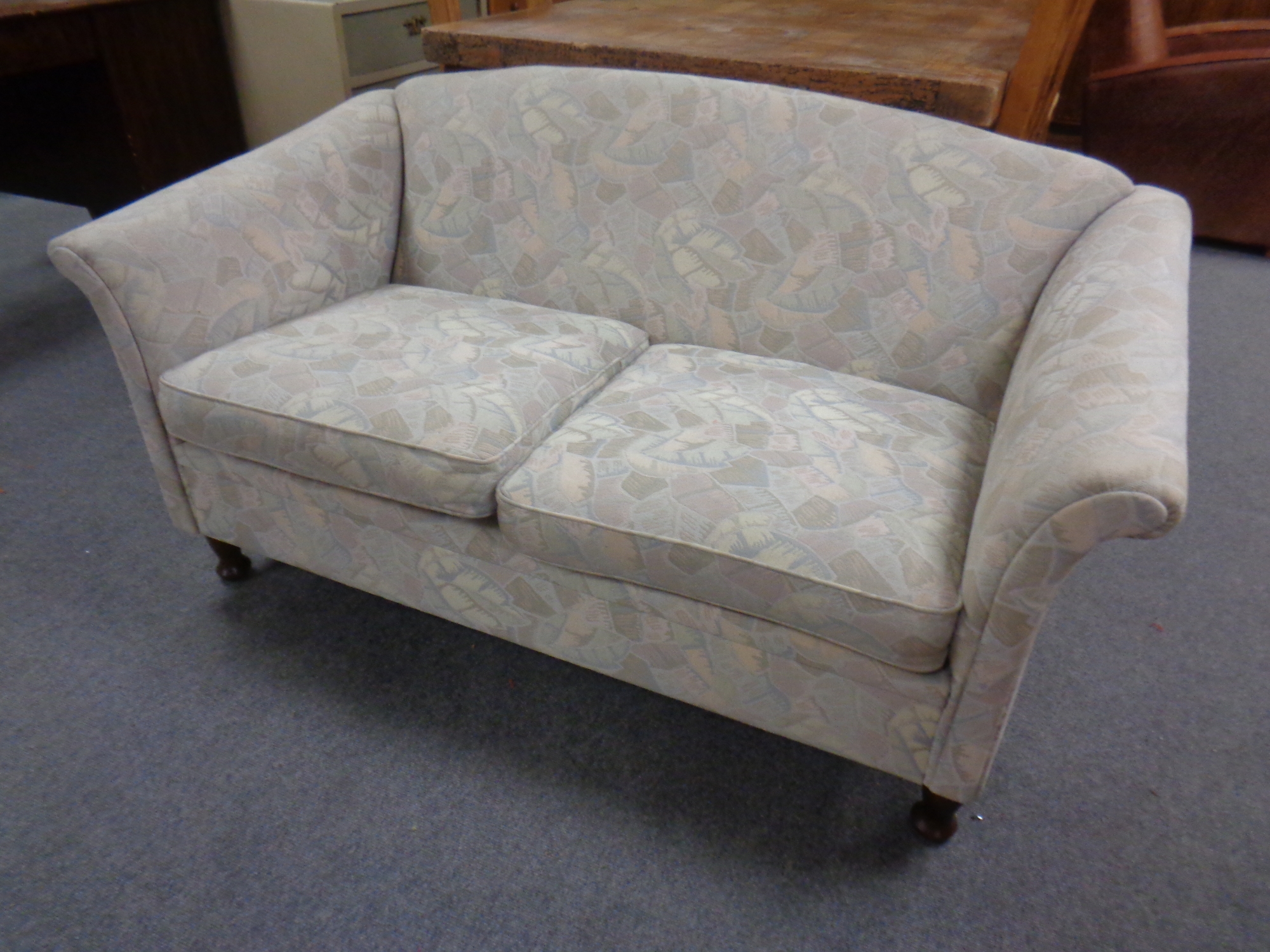 A late 20th century two seater settee