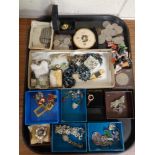 A tray of costume jewelry, lady's wristwatch, commemorative Churchill crown,