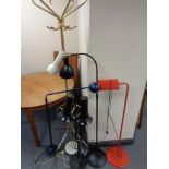 Five 20th century floor lamps with a brass hat and coat stand
